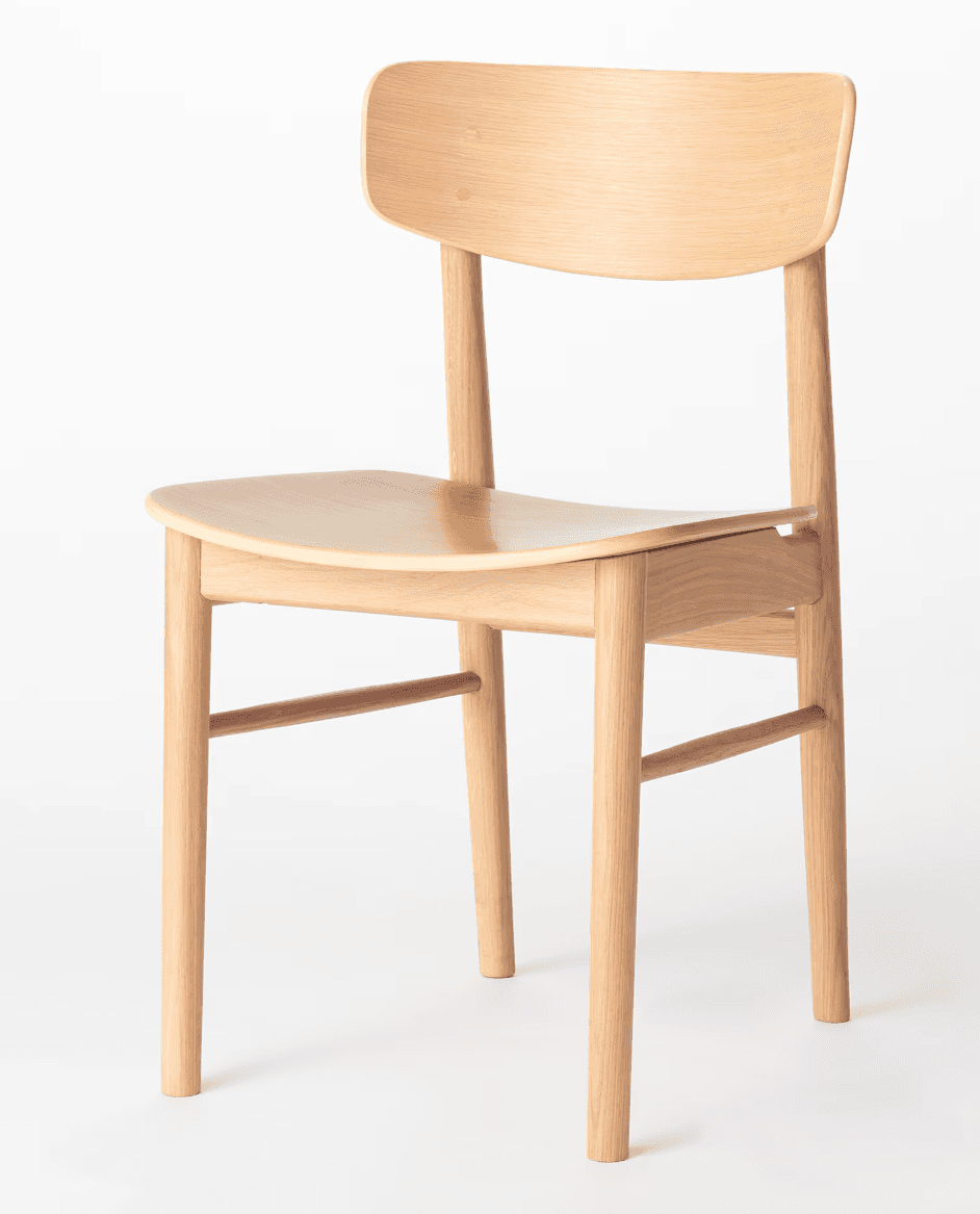An armless dining chair constructed entirely from light-toned wood, likely oak or ash, with a natural finish. It features a gently curved backrest and a contoured seat, supported by four round, tapered legs reinforced with horizontal stretchers. — 3D model