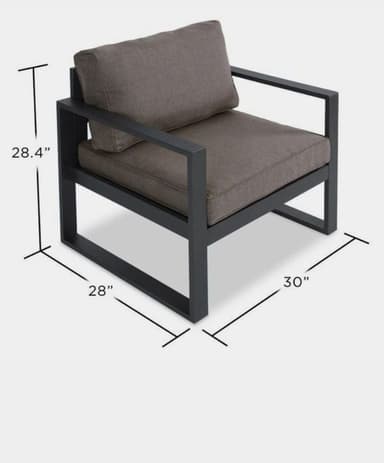 A modern outdoor lounge armchair featuring a dark gray metal frame and two removable brown fabric cushions. The frame has a distinct boxy, minimalist design with an open base, and flat, wide armrests. The seat and back cushions are upholstered in a durable, textured brown fabric, providing comfort and contemporary aesthetic. — 3D model