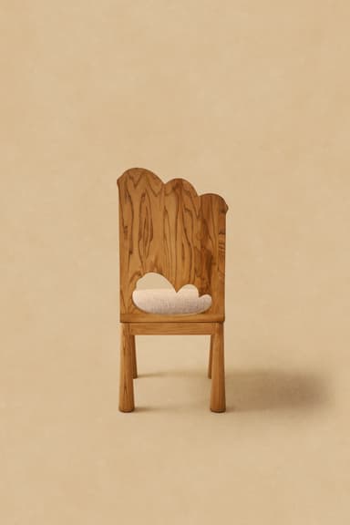 A modern armless chair featuring a wooden frame and upholstered seat and backrest. The chair's legs are stout and cylindrical, tapering slightly towards the floor. The backrest is gently curved, and both the seat and back are covered in a light beige, textured fabric. The wood has a natural, light tone, possibly oak or ash, with visible grain. — 3D model