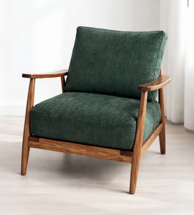 An armchair featuring an exposed wooden frame with upholstered seat and back cushions in a dark green fabric. The chair has tapered legs and curved wooden armrests, characteristic of mid-century modern design. — 3D model
