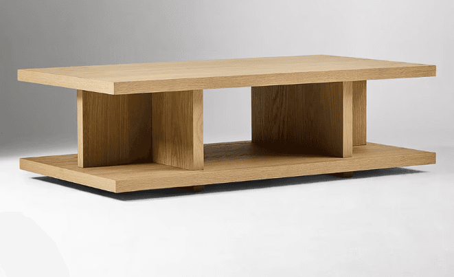 A modern, low-profile coffee table constructed from light-colored wood. The design features a rectangular tabletop with a thickness of approximately 2-3 cm, suspended above a base of similar thickness. The supports are vertical panels positioned inwards from the edges of the tabletop, creating an open cavity between the top and bottom surfaces. The grain of the wood is visible, indicating a natural material. — 3D model
