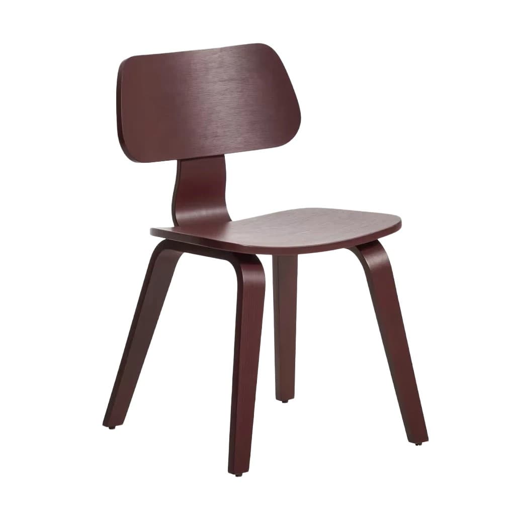 A minimalist side chair constructed entirely from dark reddish-brown bent plywood. It features a subtly contoured seat and backrest, and four splayed legs that integrate smoothly into the seat structure, creating a cohesive and fluid design. The chair appears to be in excellent, new condition. — 3D model