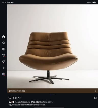 An armless lounge chair with a tan/camel upholstered finish, featuring a scooped seat and backrest. The backrest has three horizontal stitched channels. The chair is supported by a black metal swivel base with four low-profile legs. — 3D model