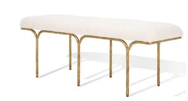 A long, upholstered bench with a rounded top and a slender, artistic metal base. The base features four legs that curve outwards from the underside of the seat, creating an open, sculptural form. The legs have a textured, organic appearance. — 3D model
