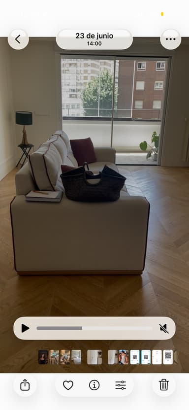 A contemporary three-seater sofa with light-colored upholstery and distinctive red contrast piping. It features three individual seat cushions and three matching back cushions. The sofa has wide, straight track arms and a low-profile, recessed plinth base, likely in a light wood finish, which gives it a floating appearance. — 3D model