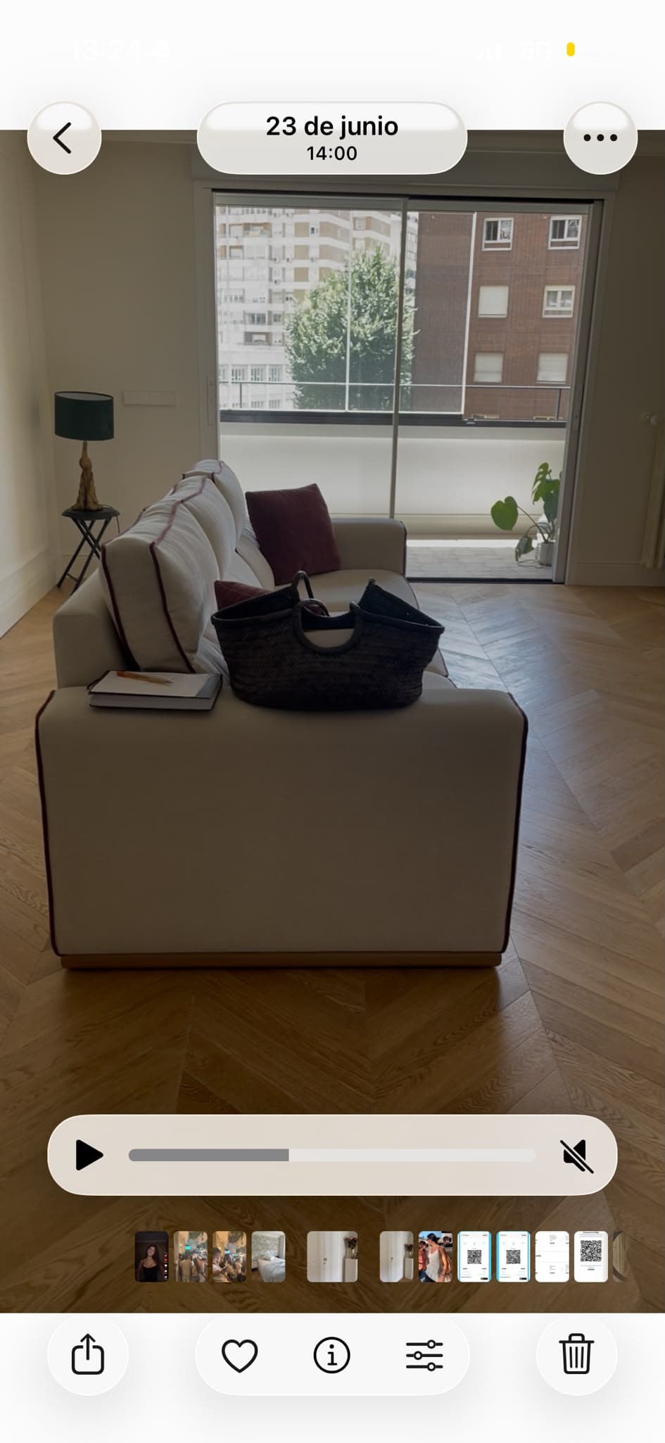 A contemporary three-seater sofa with light-colored upholstery and distinctive red contrast piping. It features three individual seat cushions and three matching back cushions. The sofa has wide, straight track arms and a low-profile, recessed plinth base, likely in a light wood finish, which gives it a floating appearance. — 3D model