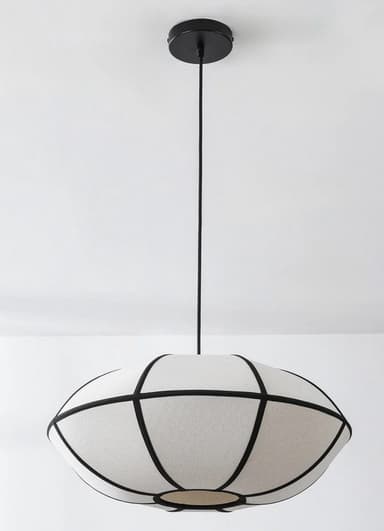A close-up view of the underside of a fabric chandelier. The shade is constructed from light-colored, textured fabric panels, divided by dark, possibly black, binding or trim. The panels create a somewhat spherical or drum-like shape. An exposed incandescent light bulb is visible through a central opening at the bottom, with internal support structures for the shade also discernible. — 3D model