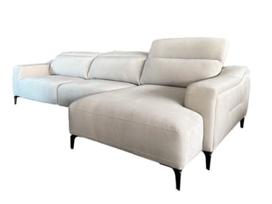 A light gray sectional sofa with a chaise lounge extension. The sofa features plush cushions and a modern design with angular armrests and subtly decorative stitching on the sides. It is supported by slender, dark-colored legs. — 3D model