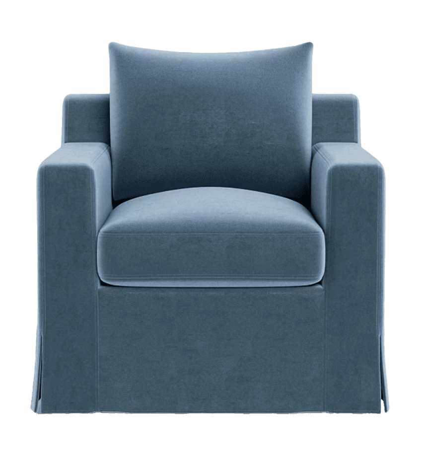 A plush, slipcovered armchair with a skirted base and a single throw pillow. The armchair features a boxy silhouette with straight arms and a deep seat. — 3D model