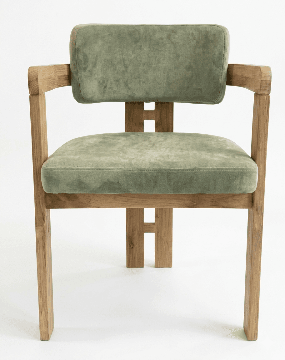 A modern armchair featuring a solid wood frame with light-toned wood and sage green upholstered seat and back. The design incorporates clean lines with rounded armrests, providing both comfort and a contemporary aesthetic. — 3D model