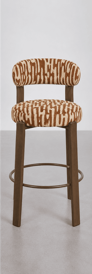 A contemporary bar stool featuring a dark wood frame and distinctive zebra-print upholstery. The stool has a circular padded seat and a curved, embrace-like backrest, both covered in a brown and beige animal pattern. The frame consists of four sturdy wooden legs, reinforced by a circular metal footrest positioned at a fixed height. The overall design suggests a blend of modern aesthetics with an eclectic or bold accent provided by the upholstery. — 3D model