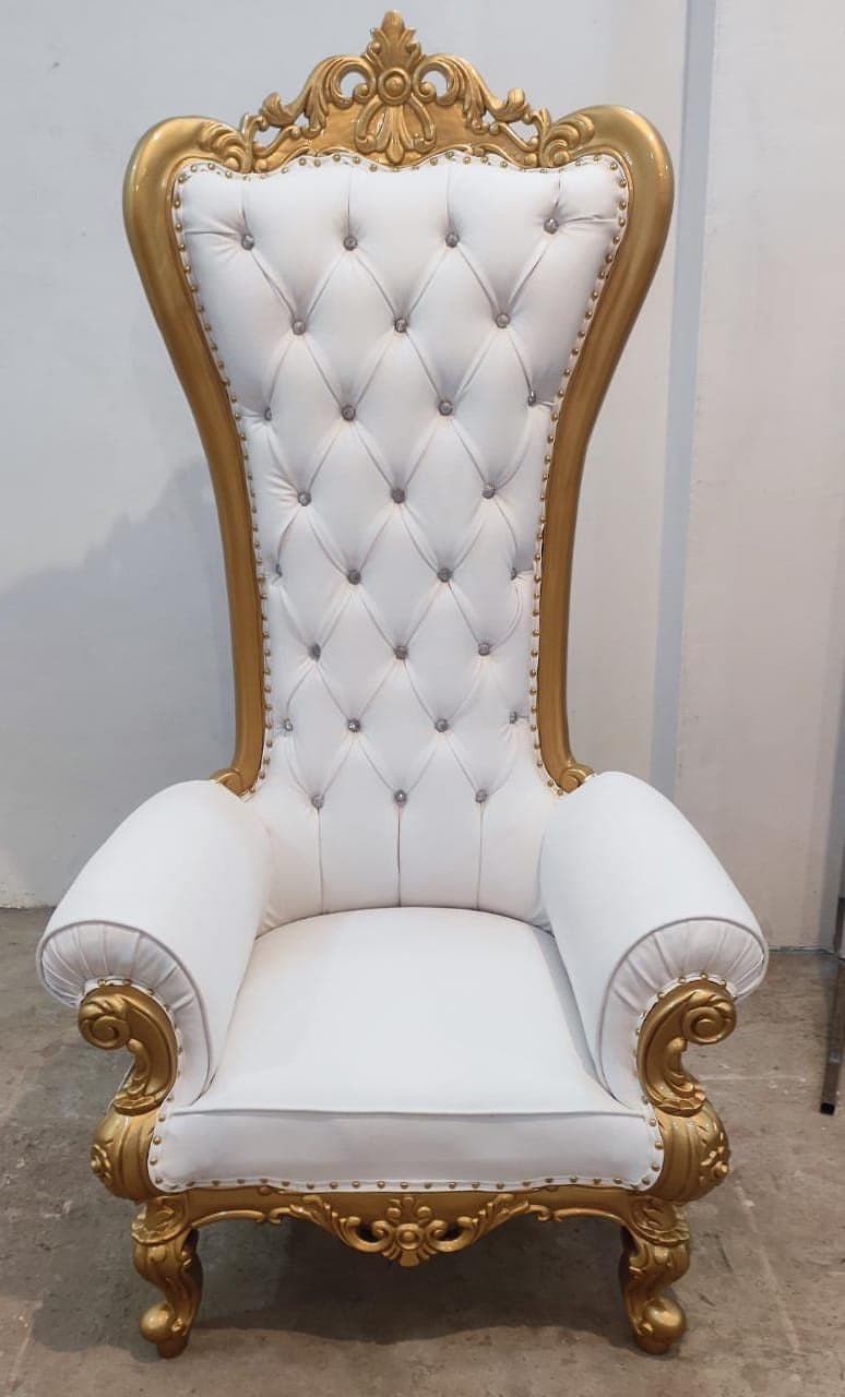 A highly ornate, white and gold chair featuring an exceptionally tall, tufted back with crystal buttons, rolled arms, and heavily carved details on its frame and legs. — 3D model