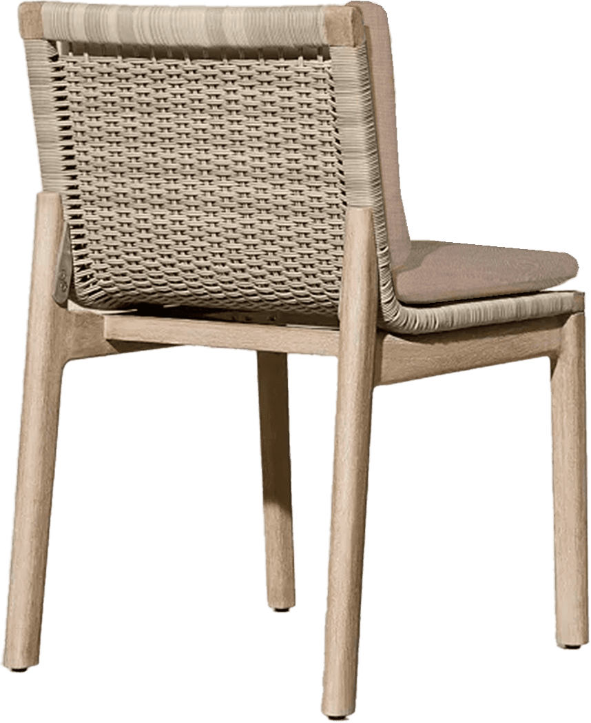 A modern armless chair featuring a light-colored wooden frame, a woven backrest, and a soft seat cushion. — 3D model