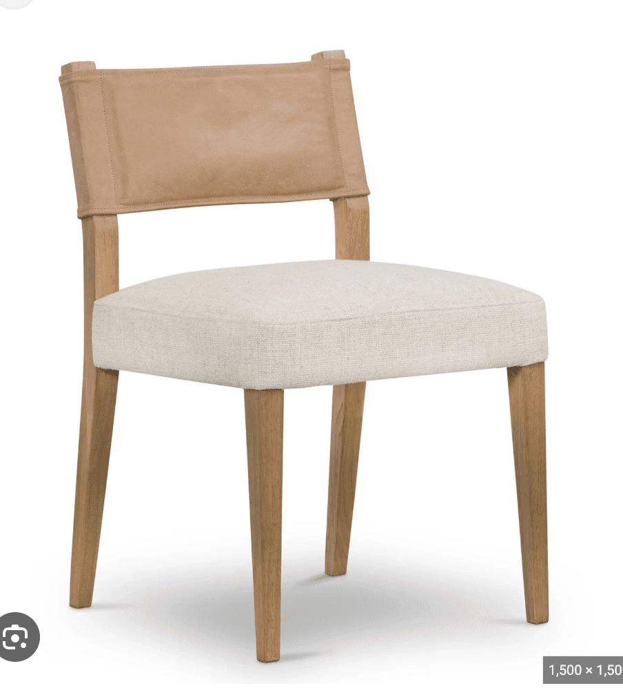 A contemporary chair with a light-colored wooden frame and legs. The seat is upholstered in a textured, light beige fabric. The backrest features a tan leather panel stretched taut between the wooden frame elements, attached with visible stitching along the edges. The overall design is minimalist with clean lines. — 3D model