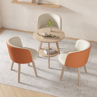 A light-colored wooden side table featuring a round top surface and a smaller, round lower shelf for additional storage or display. The table is supported by three splayed legs, creating a stable and visually appealing structure. The wood grain is visible, indicating a natural finish. — 3D model