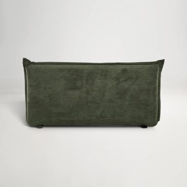 A convertible sofa bed upholstered in dark green corduroy fabric. The piece features a low profile with a rolled armrest/base and a fold-out mattress configuration. It includes two rectangular throw pillows that match the upholstery. — 3D model