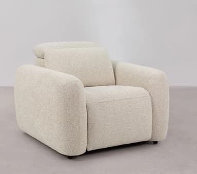 A modern armchair with a plush, upholstered design. It features rounded arms and a generously padded seat and backrest, suggesting comfort and contemporary style. The fabric has a textured, bouclé-like weave. — 3D model