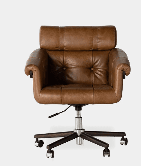 A classic executive-style office chair upholstered in rich cognac brown tufted leather. The chair features rolled armrests and a high backrest, both with button tufting. It sits on a five-star base with dark wood finish spokes and silver-toned casters, and includes a swivel mechanism and height adjustment lever. — 3D model