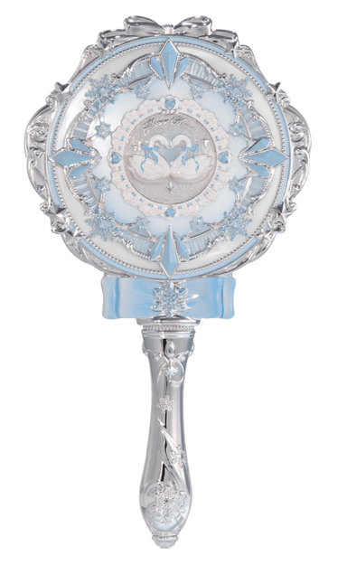 An ornate hand mirror featuring an oval reflective surface encased in an elaborately decorated frame. The frame and handle are silver-toned with intricate scrollwork, filigree, and raised decorative elements. Light blue accents, including crystalline shapes, snowflakes, and a ribbon bow, adorn the frame. The center of the mirror's backplate features a light blue and white emblem with two swans. The handle is slender and sculpted, complementing the decorative frame. — 3D model