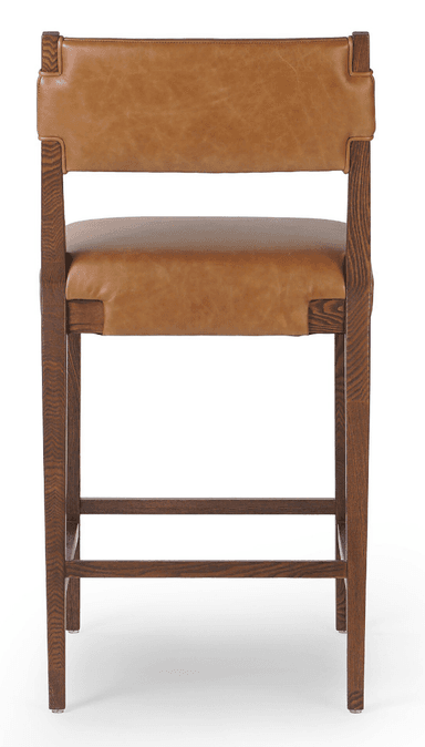 A bar stool featuring a sturdy dark oak wood frame and a brown leather upholstered seat and backrest. The backrest and seat are integrated into the frame with distinctive wrap-around detailing of the leather around the wood. It has two horizontal footrests and visible wood grain. — 3D model