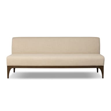 A rectangular bench with a high backrest, upholstered in a textured light beige fabric. The bench is supported by a dark wood frame and four angled legs, two visible at the front and two implied at the back. The design appears modern and minimalist. — 3D model