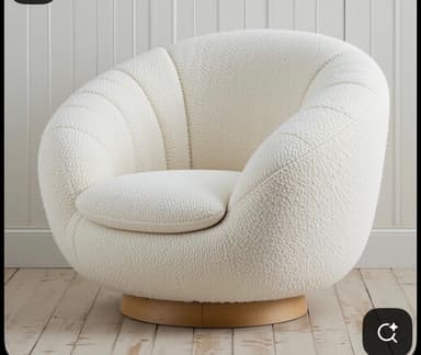 A contemporary rounded swivel lounge chair upholstered in a textured off-white boucle fabric, featuring a single seat cushion and a wooden plinth base. — 3D model