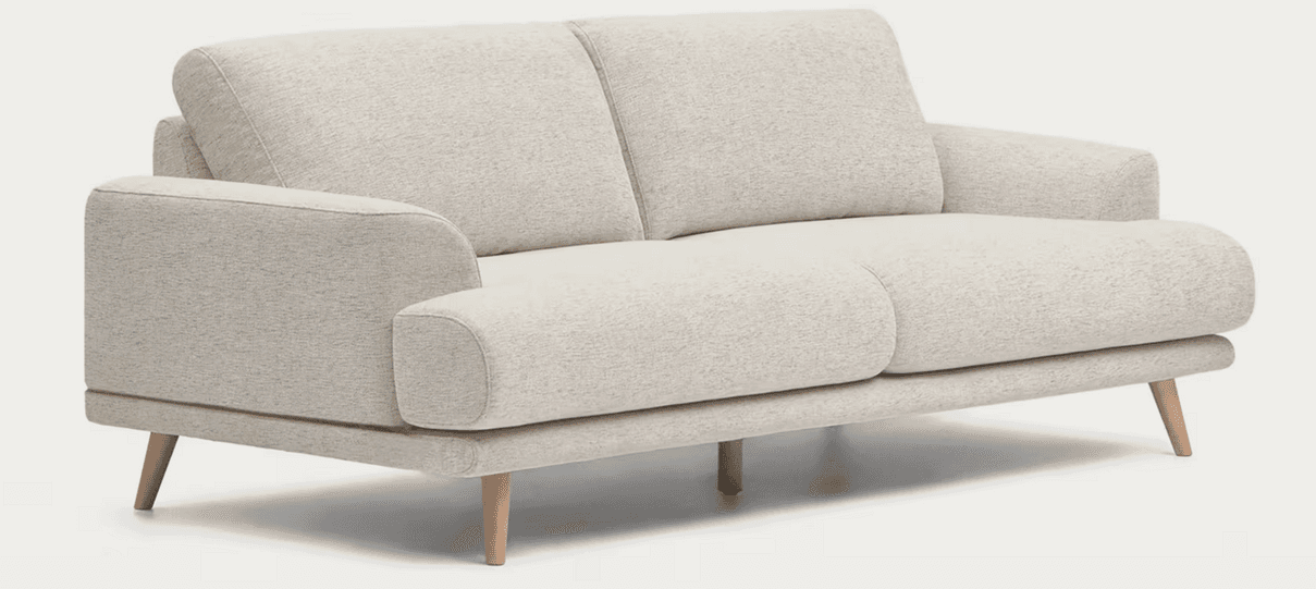 A contemporary two-seater sofa upholstered in a light beige, textured fabric, featuring rounded arms and back cushions. The sofa is supported by four light-toned, tapered wooden legs. — 3D model