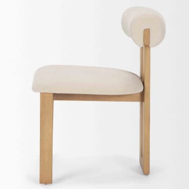 A modern dining chair featuring a light-toned wooden frame and cream-colored textile upholstery. The chair has a distinctive cylindrical backrest, also upholstered, which is supported by two vertical wooden slats extending from the main frame. The seat is a padded, upholstered square cushion. The chair stands on four straight, tapered wooden legs. Its design is minimalist and contemporary, with clean lines and a neutral color palette. — 3D model
