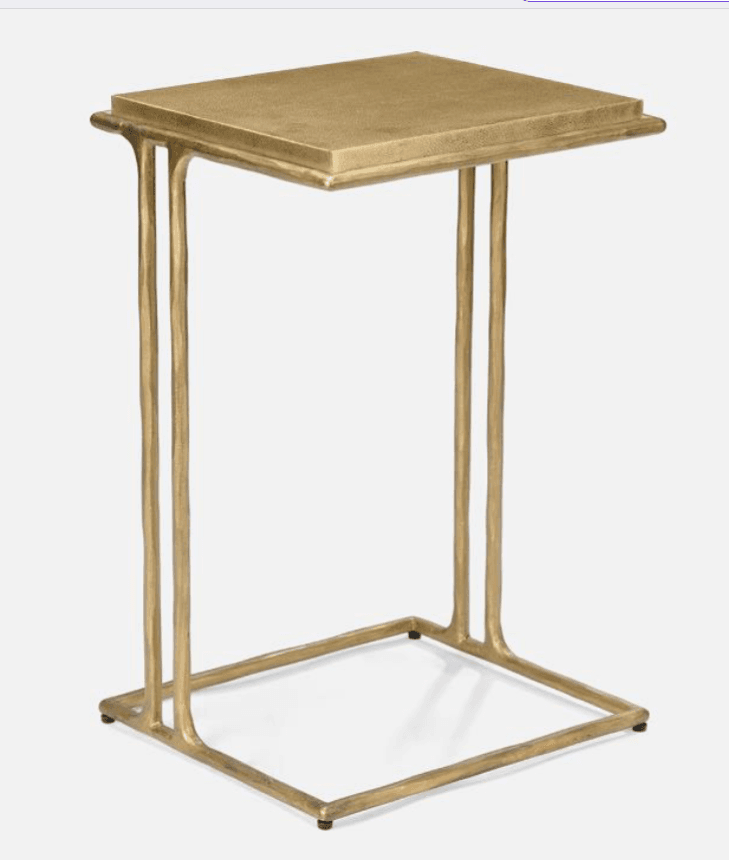 A gold-toned metal C-table with a textured finish, featuring a rectangular top and a C-shaped continuous frame designed to slide over seating. — 3D model