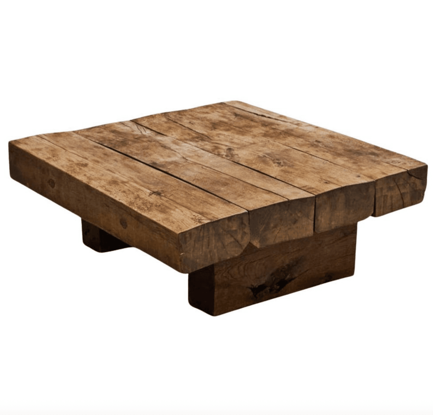 A rustic, low-profile coffee table constructed from thick, unfinished wooden planks. The tabletop is composed of several planks laid side-by-side with visible gaps and cracks, suggesting a reclaimed wood aesthetic. The base is formed by two solid, stacked wooden blocks, one wider than the other, providing a sturdy foundation. The edges of the wood are rough and irregular, contributing to its natural, unrefined appearance. — 3D model