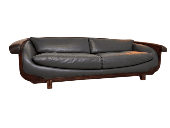 A two-seater sofa featuring a distinctive dark wood frame with integrated curved armrests and back, upholstered with dark gray leather cushions. — 3D model