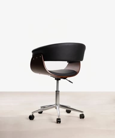 A close-up view of a lounge chair, highlighting its curved bentwood frame in a rich brown finish and contrasting black upholstered seat and backrest. The black upholstery features a subtle pebbled texture and visible stitching, suggesting leather or a high-quality faux leather. The wooden frame exhibits a distinct grain pattern, indicating a molded plywood or bentwood construction that creates a sleek, continuous curve. The design suggests a modern or mid-century aesthetic. — 3D model