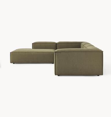 A sectional sofa with a modular design, featuring low-profile, block-like modules. It is upholstered in a textured, olive-green fabric and configured in an L-shape. The sofa has clean lines and a contemporary aesthetic, with visible seams separating the individual modules. The arms and backrests are integrated into the modular units. — 3D model
