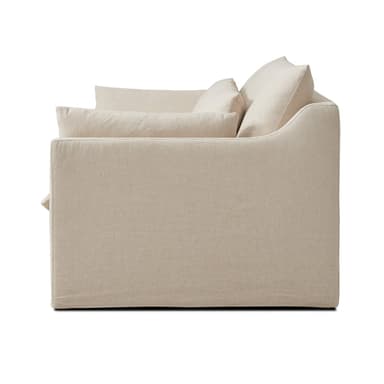 A sofa viewed from the back. It features a simple, modern design with clean lines. The sofa has a low profile and is upholstered in a textured, light-colored fabric. — 3D model