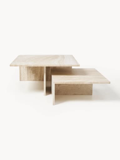 A two-tiered coffee table constructed from travertine stone. The table features a staggered shelf design, with the upper tier extending further forward than the lower tier. The material exhibits natural veining and color variations typical of travertine. — 3D model