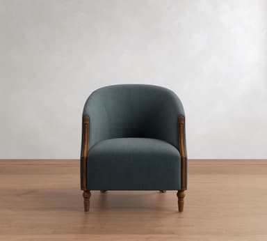 A blue-grey upholstered barrel-back accent chair with exposed dark wood trim and turned legs, featuring a curved silhouette and textured fabric. — 3D model