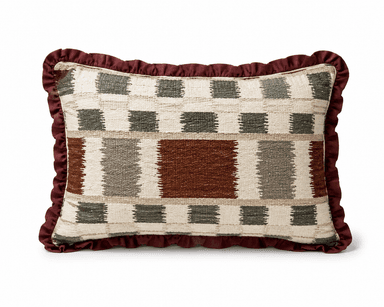 A rectangular throw pillow featuring a woven geometric pattern in shades of beige, brown, and grey, accented with a ruffled maroon trim around its perimeter. The textile exhibits a textured surface, and the pillow appears plump and well-maintained. — 3D model