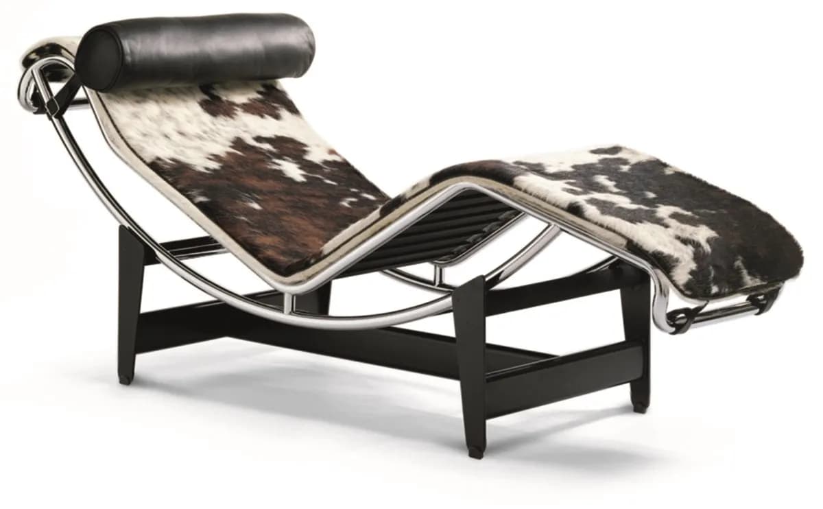 A Le Corbusier LC4 Chaise Lounge, featuring a curved polished chrome steel frame and black lacquered steel base, upholstered with a cowhide cover and a black leather cylindrical headrest. — 3D model