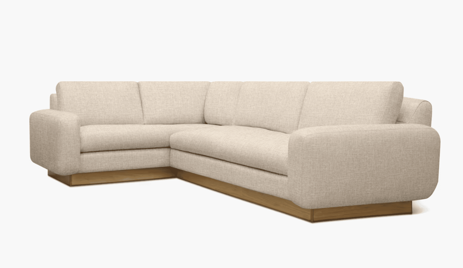 A modern sectional sofa with a low-profile wooden base. The sofa features upholstered cushions for the back and seat, and rounded armrests. The upholstery appears to be a textured light-colored fabric. — 3D model