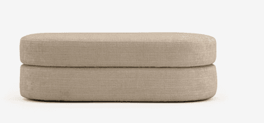 An upholstered two-tier ottoman in a light beige textured fabric, featuring a soft, rounded capsule shape. — 3D model