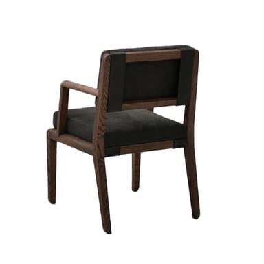 A modern armchair featuring a dark wooden frame and black upholstered cushions for the seat and backrest. The frame has straight lines and visible wood grain, indicating a solid wood construction. The armrests are integrated into the frame. The cushions appear plush and soft, providing comfort. The overall aesthetic is clean and contemporary. — 3D model