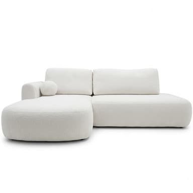 An L-shaped sectional sofa upholstered in white or off-white boucle fabric, featuring soft, rounded edges and a low-profile design. The sofa consists of two main modules: a two-seater section and a right-hand chaise lounge. It includes two back cushions, one integrated cylindrical armrest on the chaise side, and a matching spherical accent pillow. — 3D model