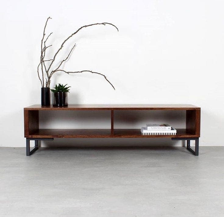 A long, low-profile media console featuring a dark brown wood-look finish and two open storage compartments. It is supported by black, U-shaped metal legs at each end, contributing to its modern industrial aesthetic. The design is simple, functional, and features clean lines. — 3D model
