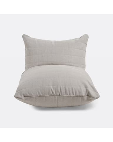 A contemporary bean bag chair with a low profile and an ergonomic design. It features a channel-stitched pattern on the backrest and seat, giving it a structured yet soft appearance. The filling appears to be flexible, allowing the chair to conform to the sitter's body. — 3D model