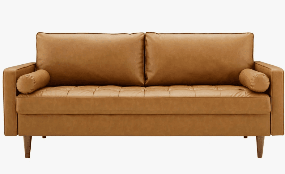 A modern two-seater sofa, commonly known as a loveseat, upholstered in a rich tan-colored material resembling leather. It features two removable back cushions, a diamond-tufted seat cushion, and two cylindrical bolster pillows positioned at each armrest. The sofa is supported by four outwardly splayed, tapered wooden legs. — 3D model