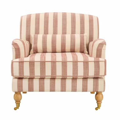 A striped armchair with a loose cushion and ornate wooden legs with casters. The armchair features a curved backrest and rolled arms, upholstered in fabric with a vertical stripe pattern in beige and muted red. A rectangular throw pillow with a similar stripe pattern is placed on the seat. — 3D model