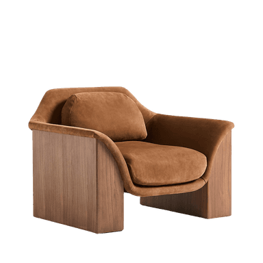 A contemporary armchair with a rounded, upholstered seat and backrest, featuring a detached lumbar cushion. The frame is constructed with solid wood panels that form substantial, block-like legs and armrests. The wood grain is prominently displayed, and the upholstery has a soft, velvety texture. — 3D model