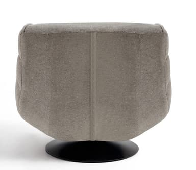 A modern armchair with a low profile and a unique curved silhouette. The armchair features deep tufting across the seat and back, creating a series of upholstered panels. It is supported by a flat, circular swivel base in a matte black finish. The overall design suggests comfort and contemporary aesthetics. — 3D model