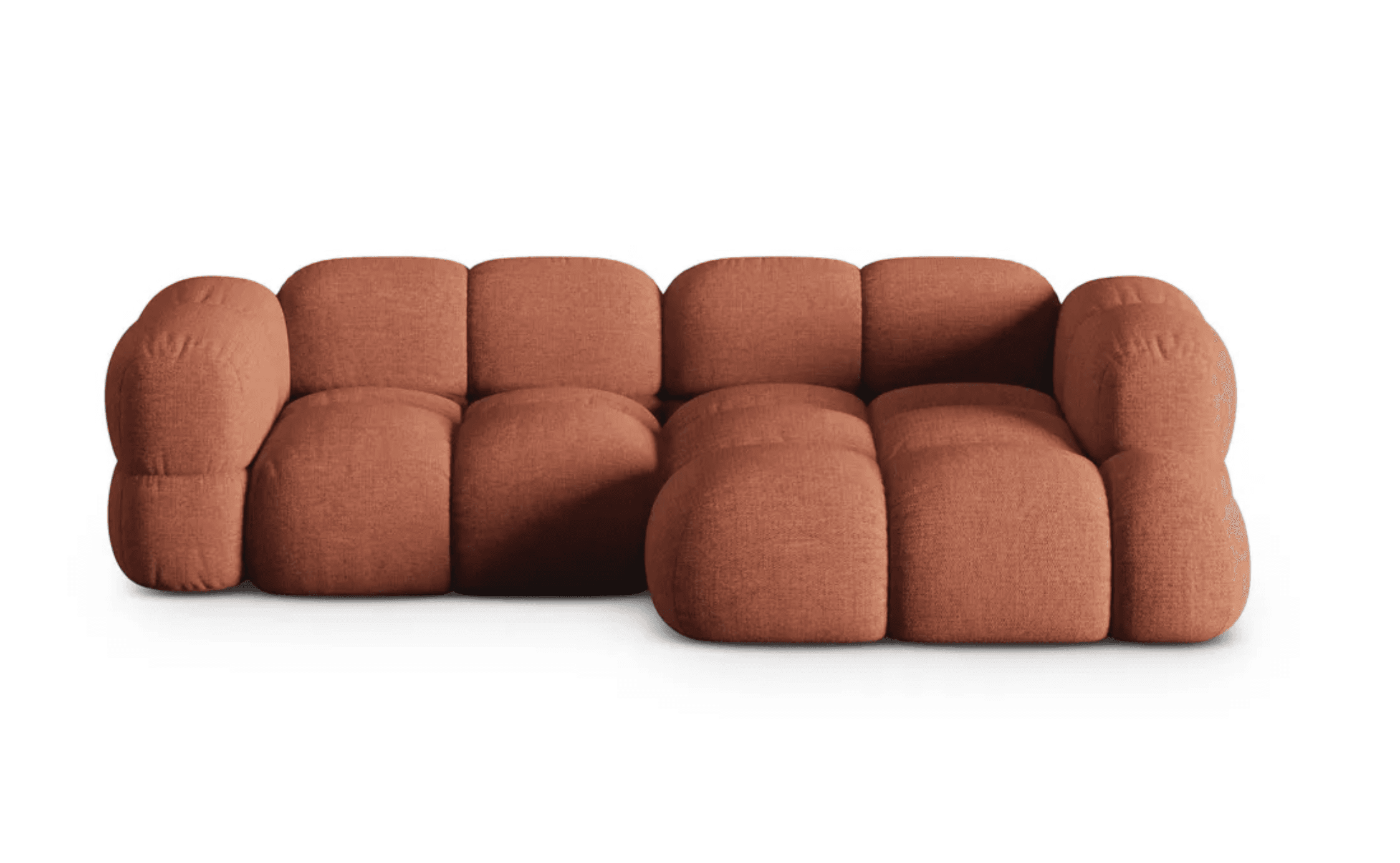 A modular sofa with a rounded, puffy design, featuring distinct individual cushions for the seat and backrest. The sofa appears to be upholstered in a textured fabric and is configured in an L-shape, with an armrest on the left side. — 3D model