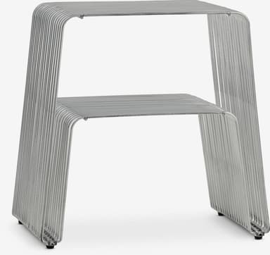 A modern chair constructed from bent metal rods. It features a minimalist design with parallel rods forming the seat and backrest, supported by a U-shaped frame. The legs also consist of bent metal rods, with a coiled design at the base. — 3D model